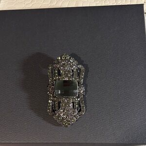 Elegant Black and Silver Brooch